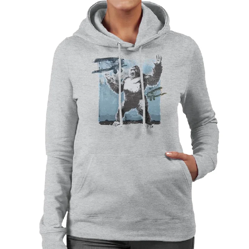 King Kong Being Attacked By Biplanes Women's Hooded Sweatshirt